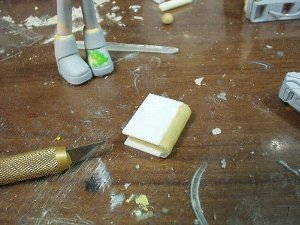 背表紙を0.5mmアルミ板でこさえてエポキシパテでコート
